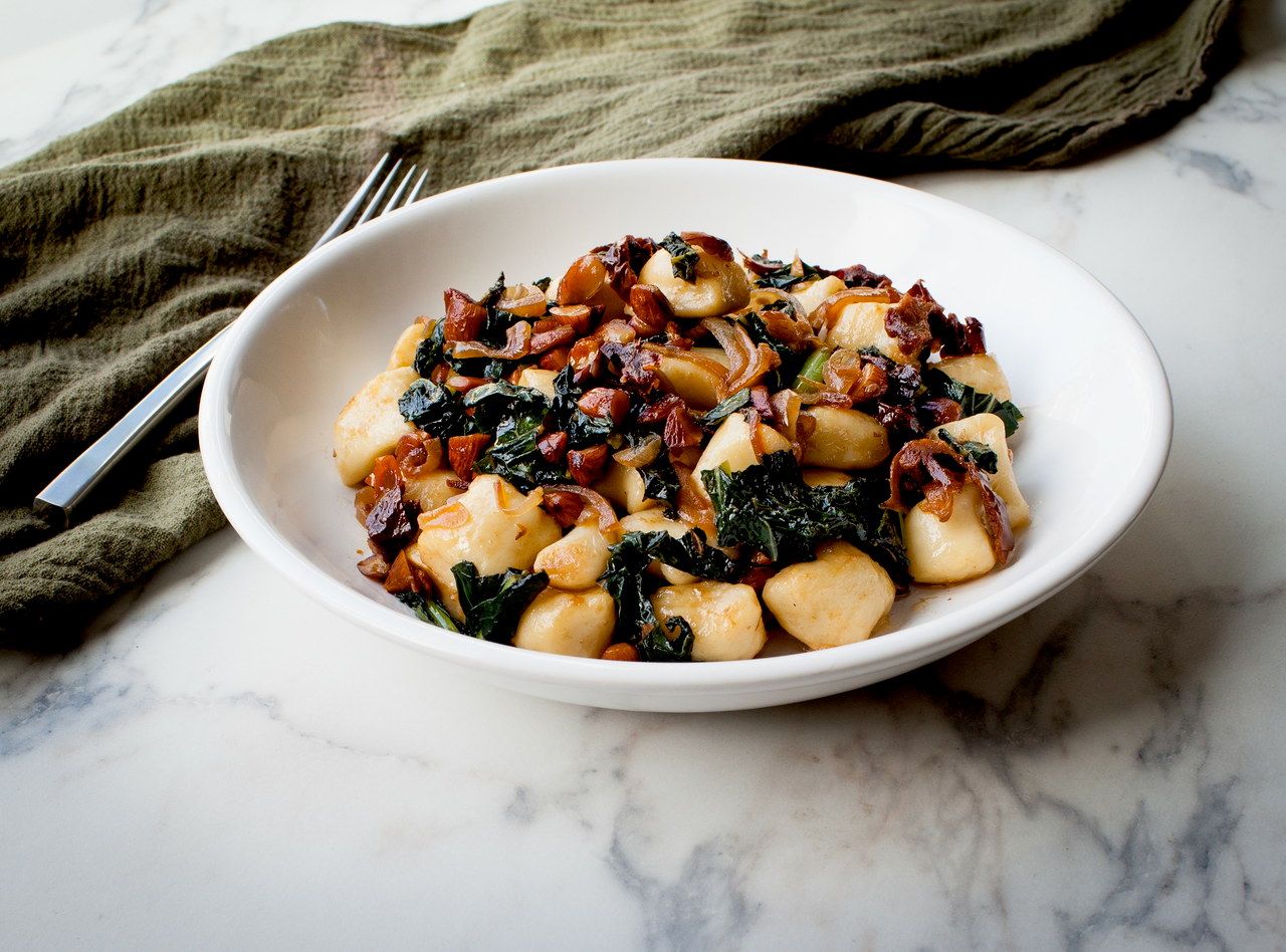 Gnocchi w/ Kale, Almonds and Shallot Sauce by Chef Travis Bettinson